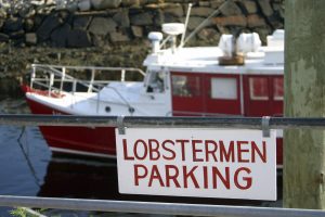 Lobster boat sign. Text: Lobstermen Parking.