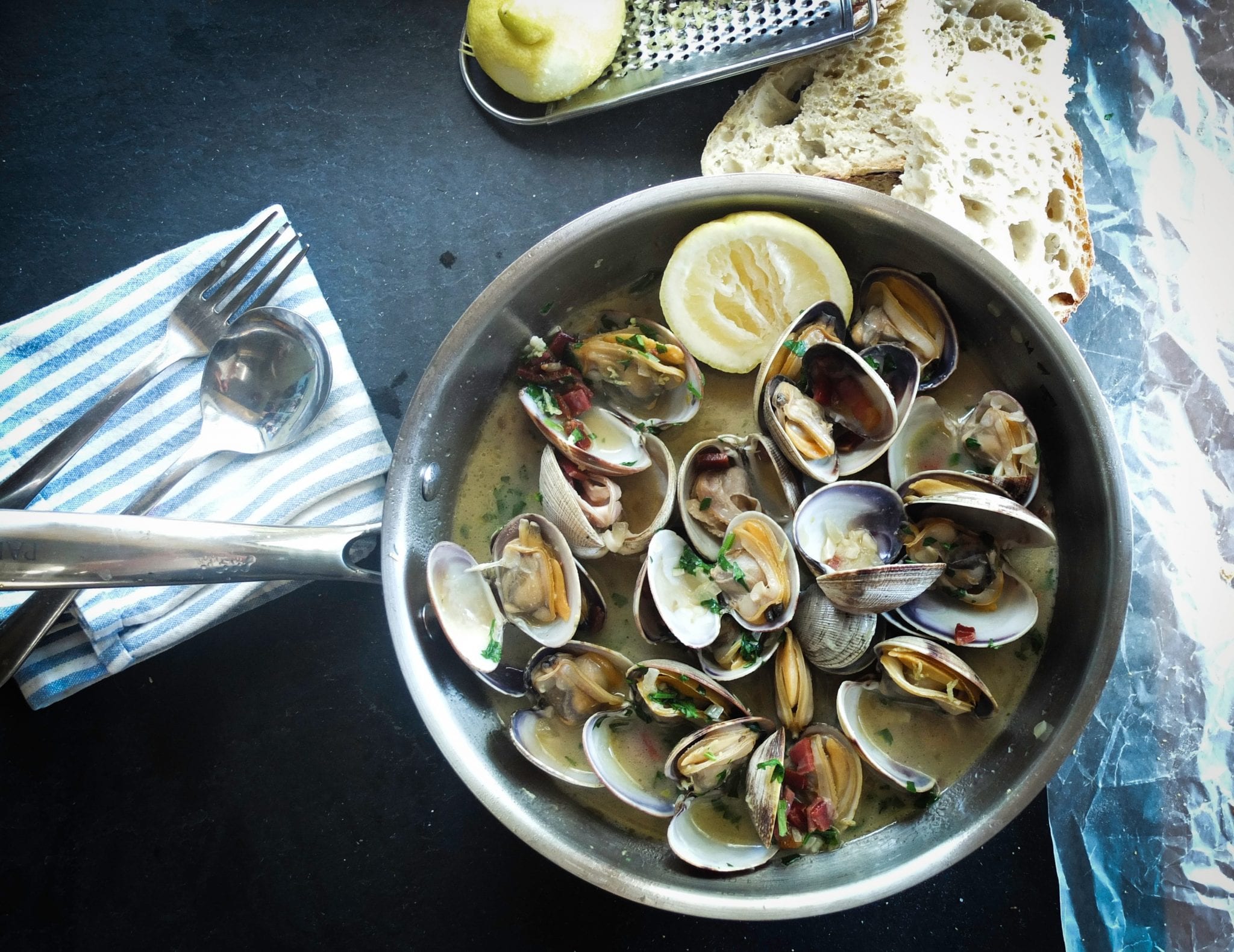 Cooked Maine clams in silver pan