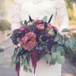 wedding venues bride with autumn bouquet